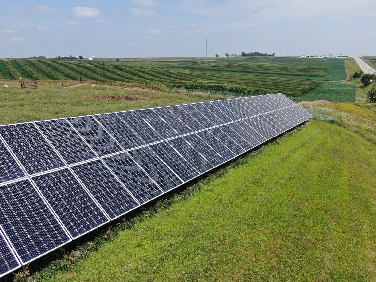 Solar array beside cultivated crop fields